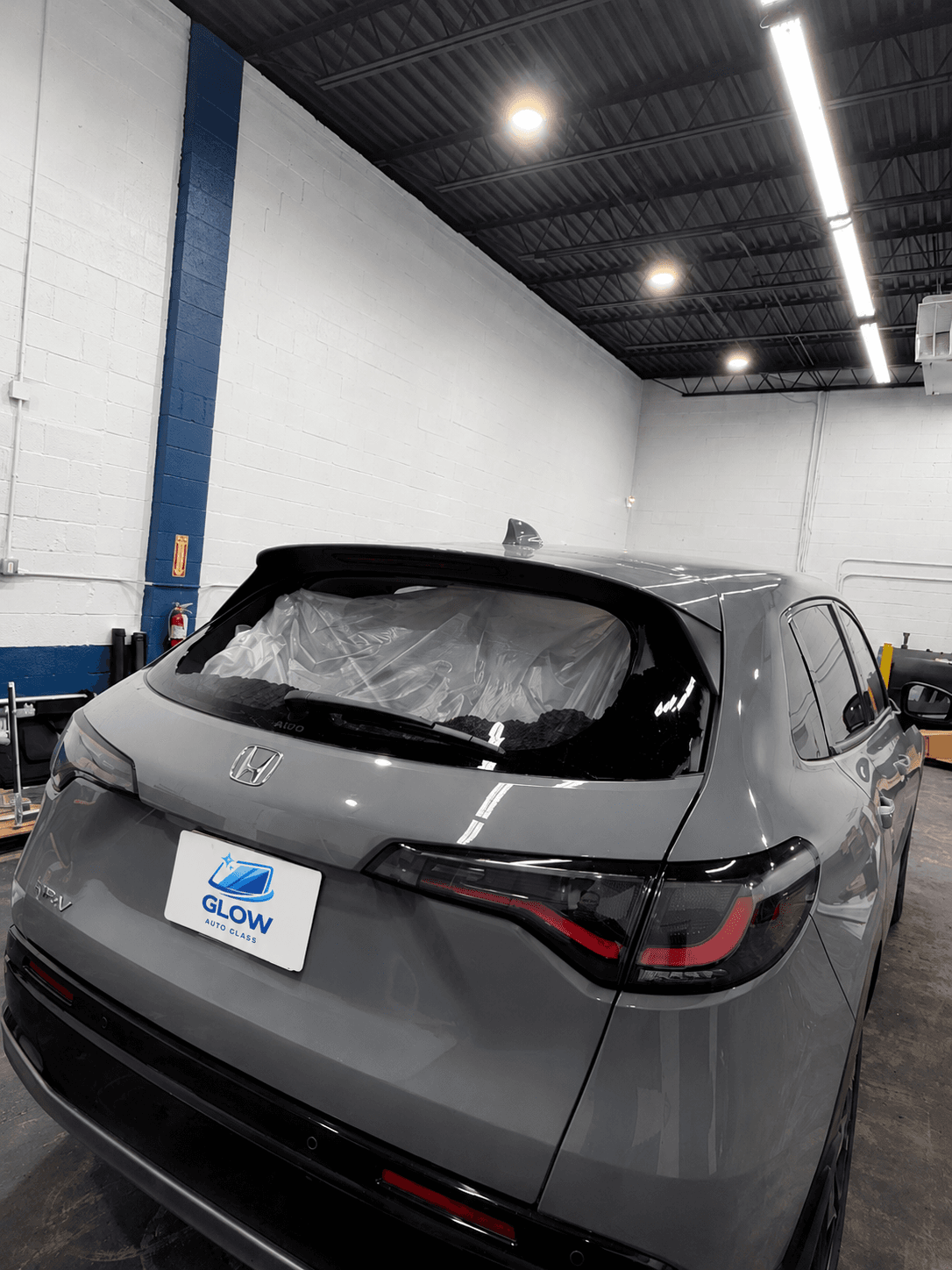 Before rear window replacement on a gray Honda CR-V in Glen Burnie, MD