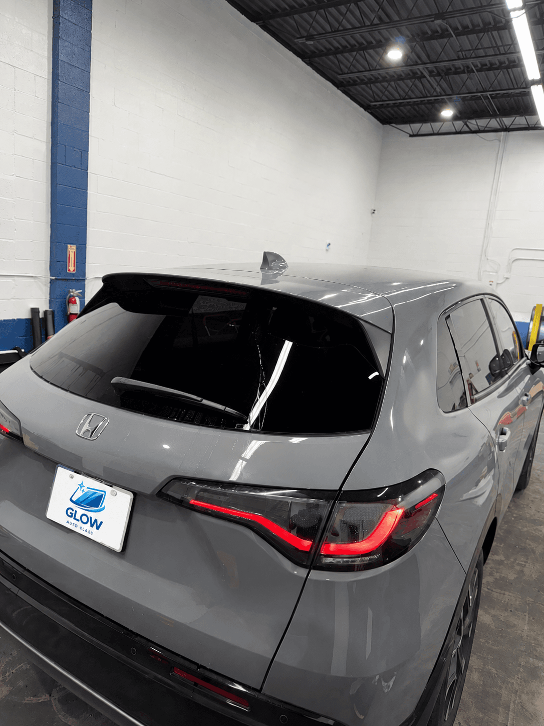 After rear window replacement on a gray Honda CR-V at Glow Auto Glass in Glen Burnie, MD